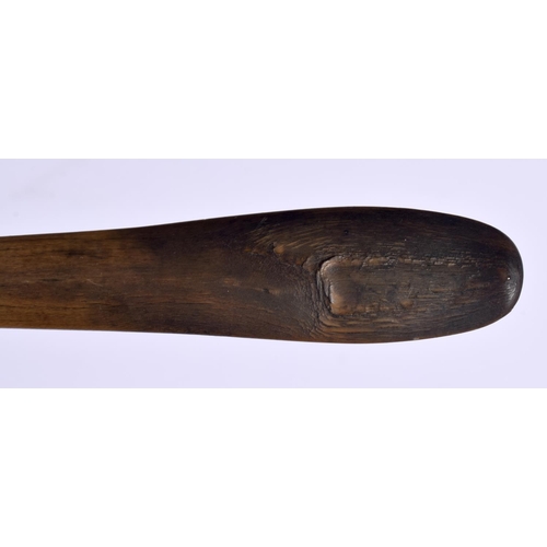 576 - A 19TH CENTURY MIDDLE EASTERN CARVED RHINOCEROS HORN LADLE. 40 cm high.