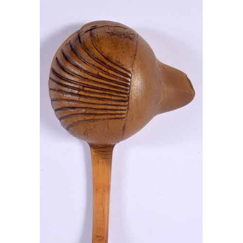 576 - A 19TH CENTURY MIDDLE EASTERN CARVED RHINOCEROS HORN LADLE. 40 cm high.