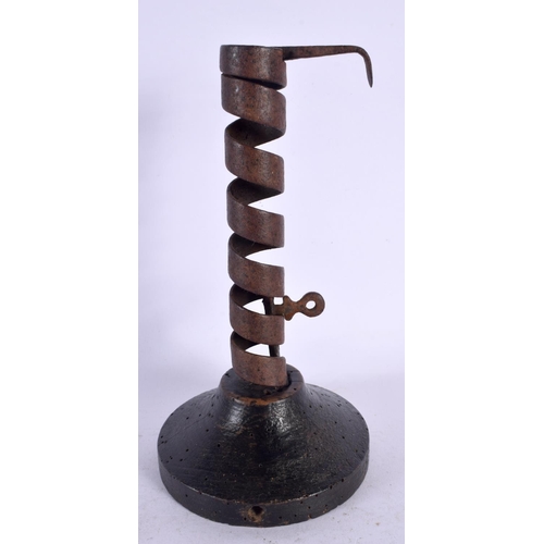577 - A GEORGE III PIG SPIRAL TWIST CANDLESTICK. 20 cm high.