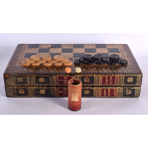 580 - AN ANTIQUE COUNTRY HOUSE FAUX BOOK LEATHER GAMING BOX with accompanying backgammon counters. Box 40 ... 