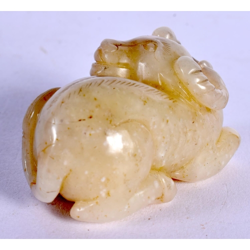 583 - A CHINESE CARVED JADE BULL 20th Century. 6 cm x 3 cm.