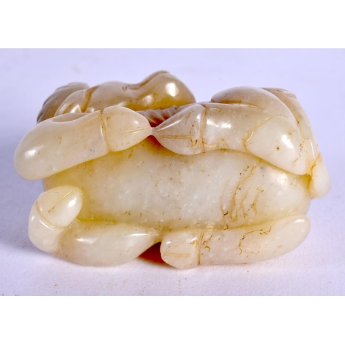 583 - A CHINESE CARVED JADE BULL 20th Century. 6 cm x 3 cm.