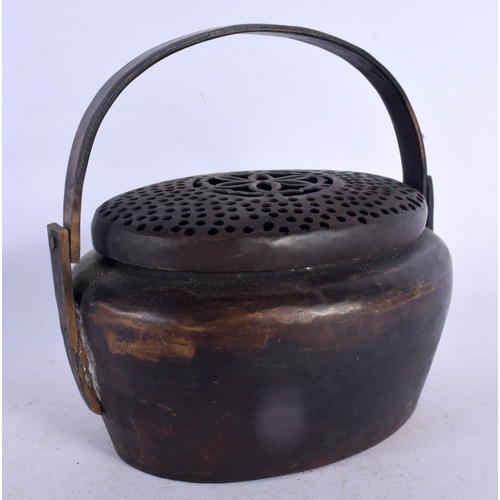 584 - A CHINESE SWING HANDLED CENSER AND COVER 20th Century. 13 cm x 15 cm.