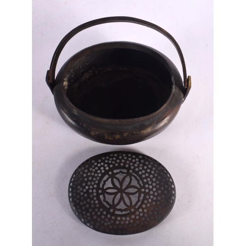 584 - A CHINESE SWING HANDLED CENSER AND COVER 20th Century. 13 cm x 15 cm.