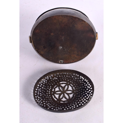 584 - A CHINESE SWING HANDLED CENSER AND COVER 20th Century. 13 cm x 15 cm.