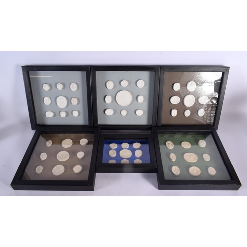 585 - A CHARMING SET OF SIX CASED EARLY 20TH CENTURY COUNTRY HOUSE INTAGLIOS PANELS. Largest 24 cm square.... 