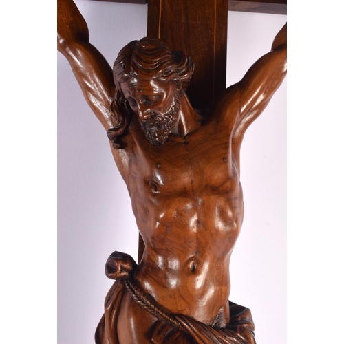 589 - A FINE 18TH CENTURY EUROPEAN CARVED FRUITWOOD CORPUS CHRISTI modelled upon a cross. 80 cm x 35 cm.
