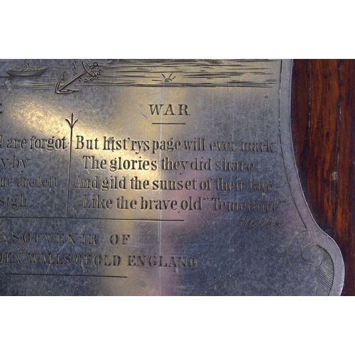 590 - A 19TH CENTURY WAR AND PEACE 1887 WOOD AND METAL SOUVENIR Maritime interest. 16 cm x 14 cm.