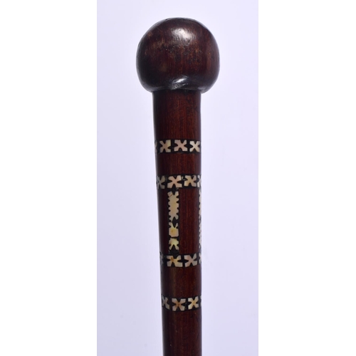 593 - A 19TH CENTURY EUROPEAN CARVED FOLK ART WALKING CANE decorated all over with portraits and vines. 88... 
