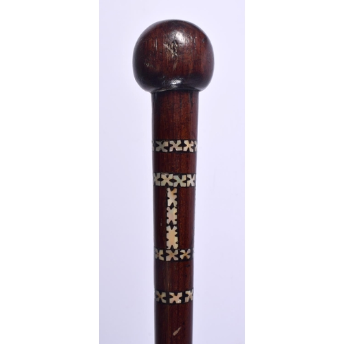 593 - A 19TH CENTURY EUROPEAN CARVED FOLK ART WALKING CANE decorated all over with portraits and vines. 88... 