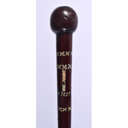 593 - A 19TH CENTURY EUROPEAN CARVED FOLK ART WALKING CANE decorated all over with portraits and vines. 88... 