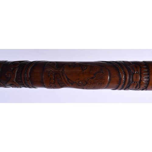 596 - A RARE AFRICAN TRIBAL CARVED WOOD TRIBAL STAFF. 81 cm long.