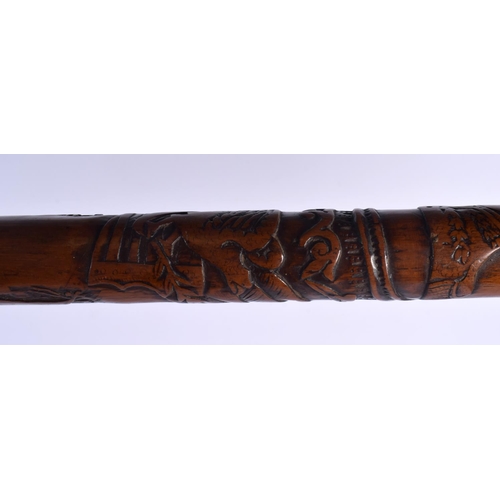 596 - A RARE AFRICAN TRIBAL CARVED WOOD TRIBAL STAFF. 81 cm long.