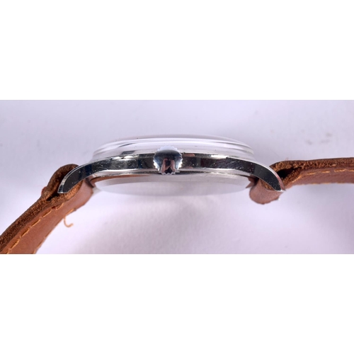 661 - A VINTAGE OMEGA PEACH DIAL WRISTWATCH. 3.75 cm wide inc winder.