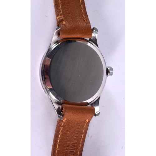 661 - A VINTAGE OMEGA PEACH DIAL WRISTWATCH. 3.75 cm wide inc winder.