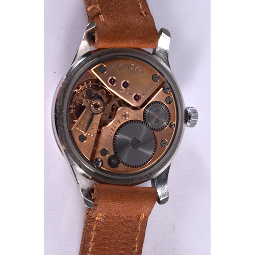 661 - A VINTAGE OMEGA PEACH DIAL WRISTWATCH. 3.75 cm wide inc winder.