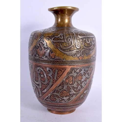 71 - A FINE 19TH CENTURY MIDDLE EASTERN SILVER INLAID BRONZE VASE decorated in mixed metals with scriptur... 