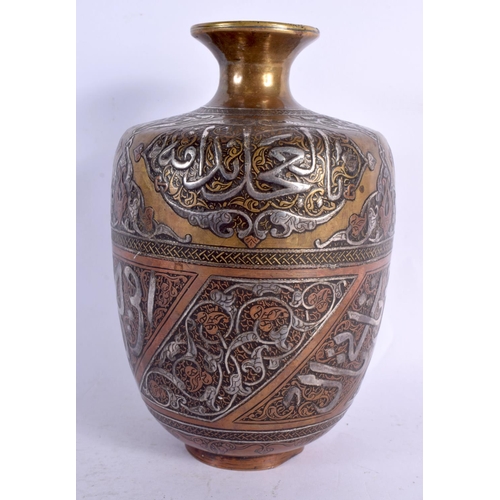 71 - A FINE 19TH CENTURY MIDDLE EASTERN SILVER INLAID BRONZE VASE decorated in mixed metals with scriptur... 