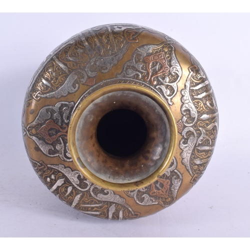 71 - A FINE 19TH CENTURY MIDDLE EASTERN SILVER INLAID BRONZE VASE decorated in mixed metals with scriptur... 