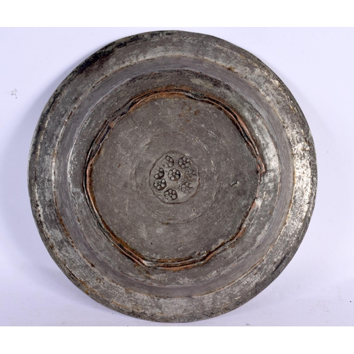 72 - AN UNUSUAL EARLY PERSIAN MIDDLE EASTERN SAFAVID TINNED BOWL incised with scripture. 17 cm diameter.