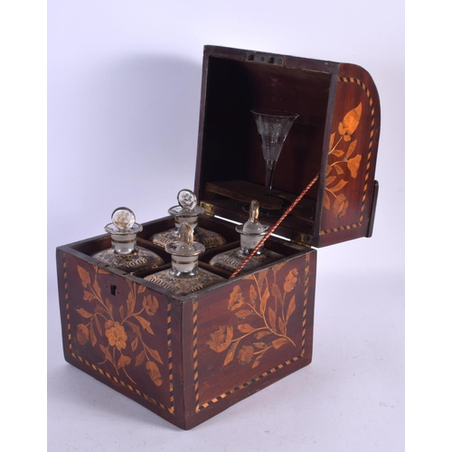 743B - AN EARLY 19TH CENTURY DUTCH MARQUETRY INLAID DECANTER SET with four glass bottles and glass. 25 cm x... 