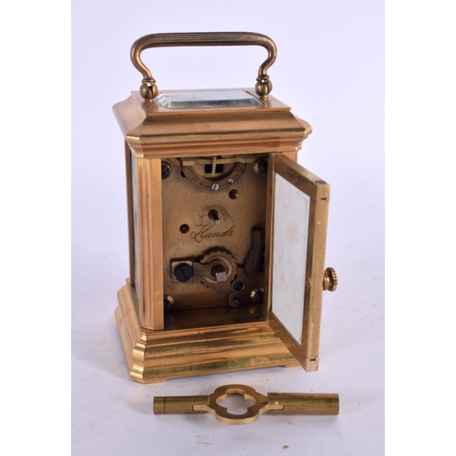 745D - A CONTINENTAL SEVRES STYLE MINIATURE CARRIAGE CLOCK. 9.25 cm high inc handle.