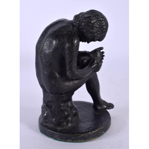 746B - A 19TH CENTURY EUROPEAN BRONZE FIGURE OF THE THORN PICKER modelled upon a circular base. 11 cm high.