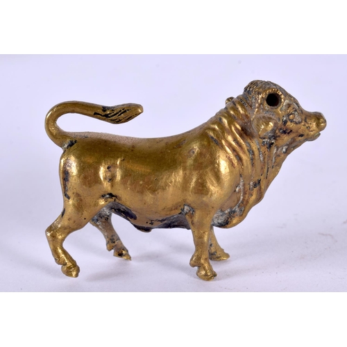 746H - AN 18TH/19TH CENTURY BRONZE FIGURE OF A BULL. 5 cm x 3.25 cm.