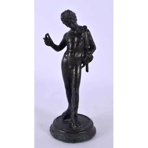 746A - A 19TH CENTURY EUROPEAN GRAND TOUR FIGURE OF A MALE modelled upon a circular base. 14 cm high.