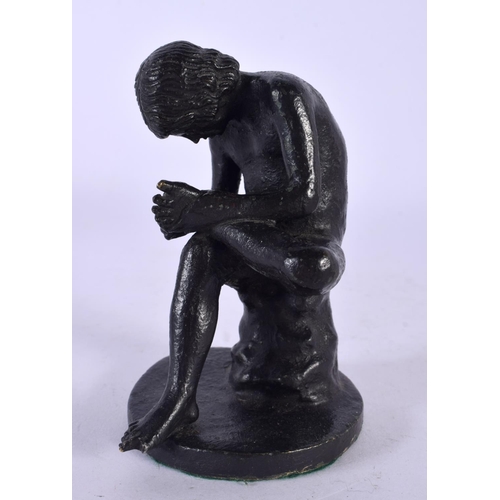 746B - A 19TH CENTURY EUROPEAN BRONZE FIGURE OF THE THORN PICKER modelled upon a circular base. 11 cm high.