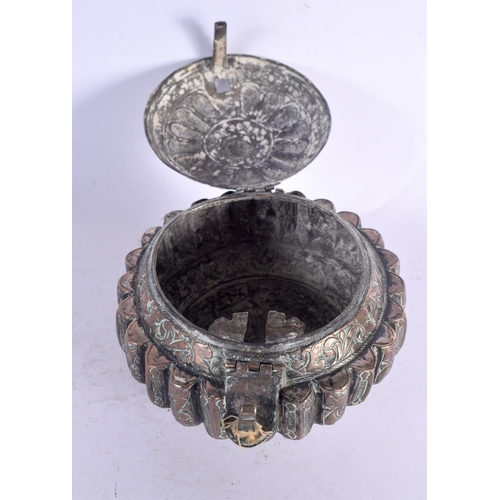 78 - A 19TH CENTURY MIDDLE EASTERN COPPER ALLOY BETEL LIME BOX possibly Bhutan. 10 cm wide.