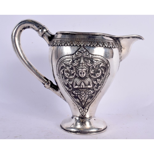 80 - A 19TH CENTURY SOUTH EAST ASIAN CHINESE TIBETAN SILVER JUG decorated with Buddhistic figures. 153 gr... 