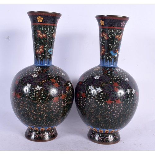 82 - A FINE PAIR OF 19TH CENTURY JAPANESE MEIJI PERIOD CLOISONNE ENAMEL VASES decorated with foliage on a... 