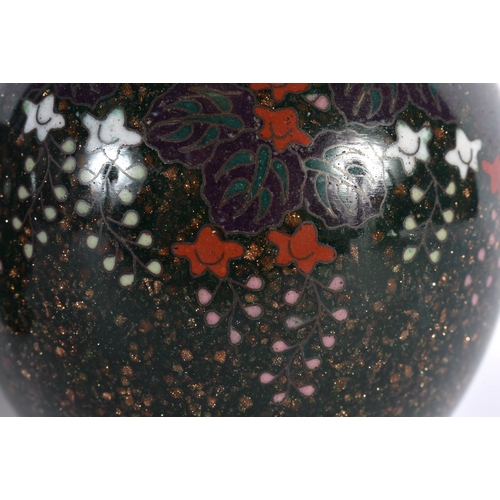 82 - A FINE PAIR OF 19TH CENTURY JAPANESE MEIJI PERIOD CLOISONNE ENAMEL VASES decorated with foliage on a... 