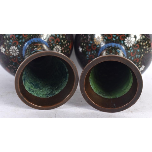 82 - A FINE PAIR OF 19TH CENTURY JAPANESE MEIJI PERIOD CLOISONNE ENAMEL VASES decorated with foliage on a... 