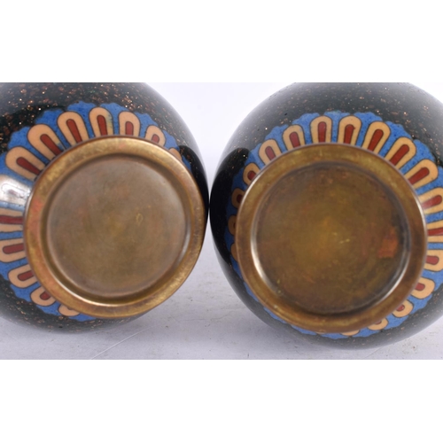 82 - A FINE PAIR OF 19TH CENTURY JAPANESE MEIJI PERIOD CLOISONNE ENAMEL VASES decorated with foliage on a... 