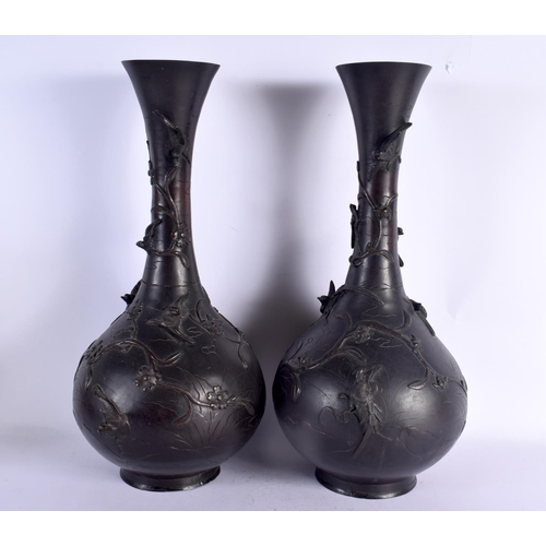 83 - A VERY LARGE PAIR OF 19TH CENTURY JAPANESE MEIJI PERIOD BRONZE VASES decorated with foliage and bird... 