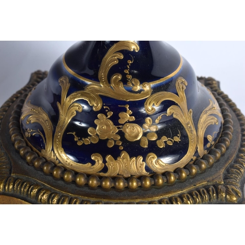 88 - A LARGE PAIR OF 19TH CENTURY FRENCH SEVRES PORCELAIN VASES AND COVERS painted with figures in landsc... 