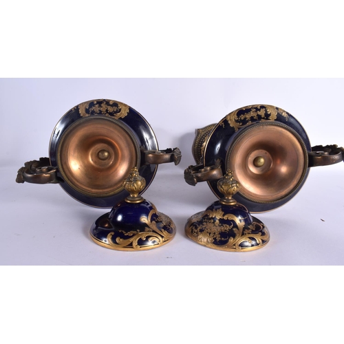 88 - A LARGE PAIR OF 19TH CENTURY FRENCH SEVRES PORCELAIN VASES AND COVERS painted with figures in landsc... 