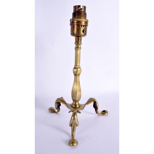 90 - TWO ART NOUVEAU BRASS CANDLESTICKS one with vaseline glass lamp fittings. Largest 47 cm high. (2)