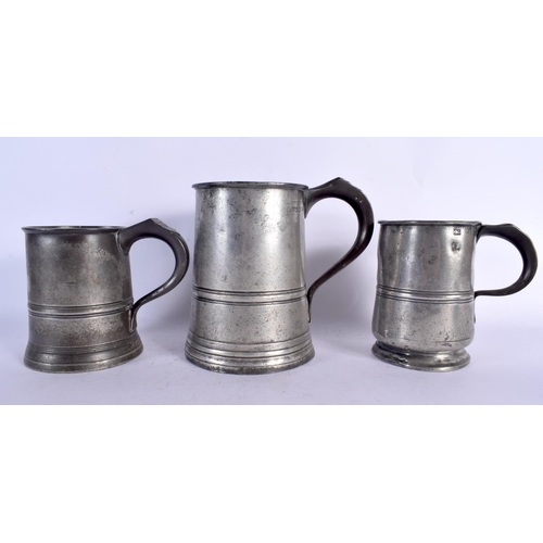 93 - TWO WILLIAM IV PEWTER MUGS together with other similar pewter. Largest 16 cm high. (7)