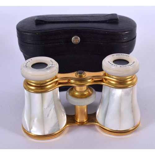 1273 - A CASED PAIR OF MOTHER-OF-PEARL OPERA GLASSES BY NEGRETTI & ZAMBRA. 5.8cm retracted, 7.5cm extended