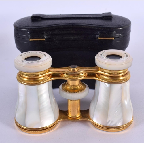 1273 - A CASED PAIR OF MOTHER-OF-PEARL OPERA GLASSES BY NEGRETTI & ZAMBRA. 5.8cm retracted, 7.5cm extended