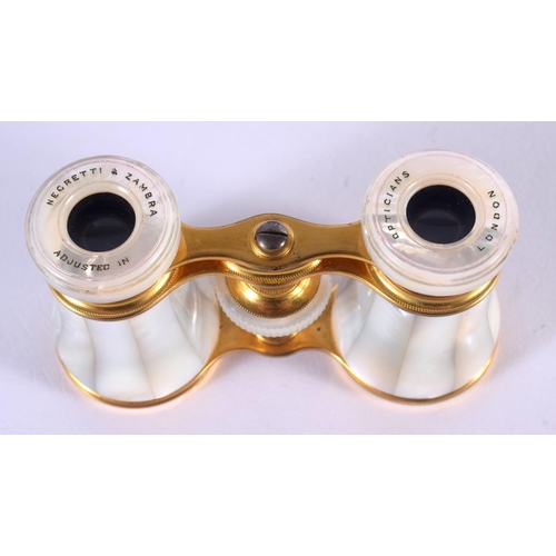 1273 - A CASED PAIR OF MOTHER-OF-PEARL OPERA GLASSES BY NEGRETTI & ZAMBRA. 5.8cm retracted, 7.5cm extended