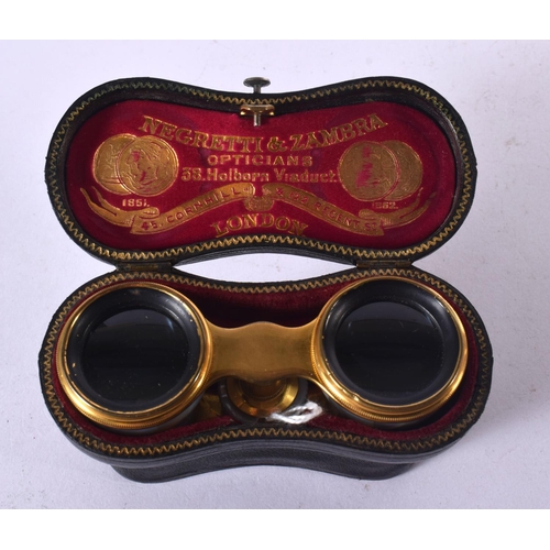 1273 - A CASED PAIR OF MOTHER-OF-PEARL OPERA GLASSES BY NEGRETTI & ZAMBRA. 5.8cm retracted, 7.5cm extended