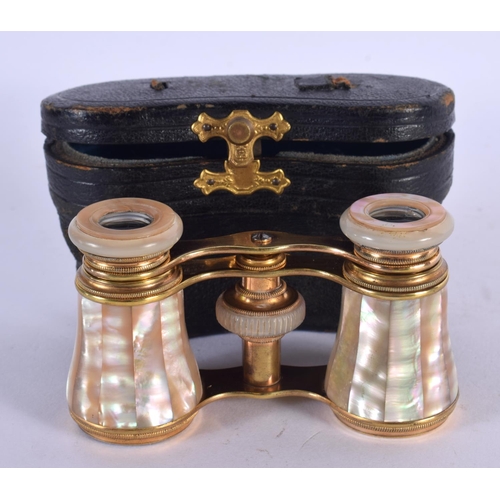 1275 - ANTIQUE CASED PAIR OF MOTHER-OF PEARL OPERA GLASSES.  5.1cm retracted, 6.7cm extended