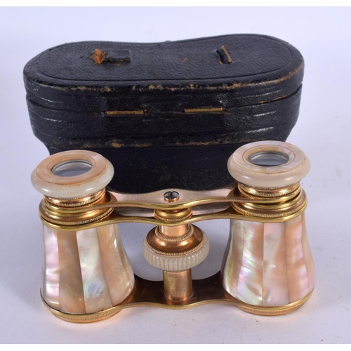 1275 - ANTIQUE CASED PAIR OF MOTHER-OF PEARL OPERA GLASSES.  5.1cm retracted, 6.7cm extended