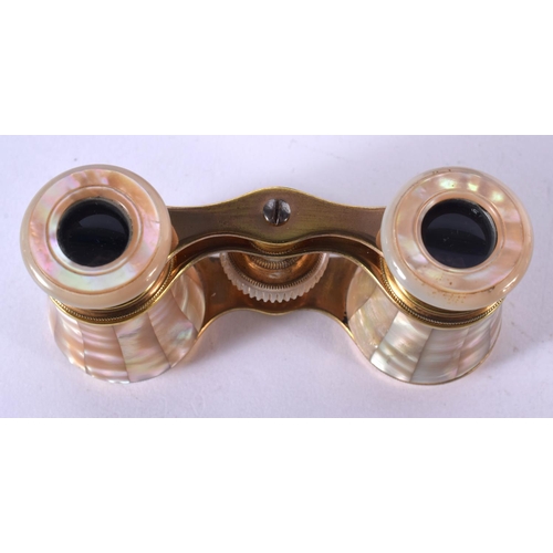 1275 - ANTIQUE CASED PAIR OF MOTHER-OF PEARL OPERA GLASSES.  5.1cm retracted, 6.7cm extended