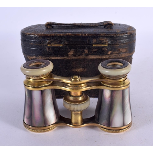 1279 - ANTIQUE CASED PAIR OF MOTHER-OF-PEARL OPERA GLASSES.  5.3cm retracted, 7.2cm extended