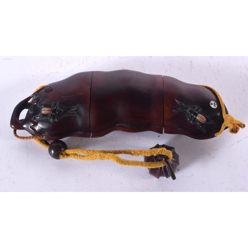 1293 - A JAPANESE BOXWOOD THREE SECTION INRO IN THE FORM OF A FRUIT POD OVERLAID WITH INSECTS.  18.5cm x 5.... 